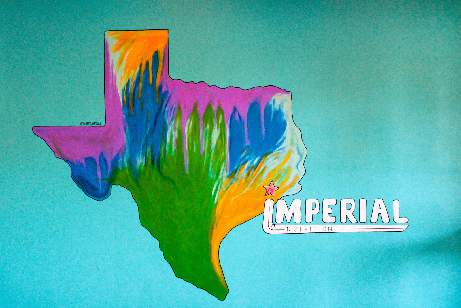The colorful Texas mural inside Imperial Nutrition